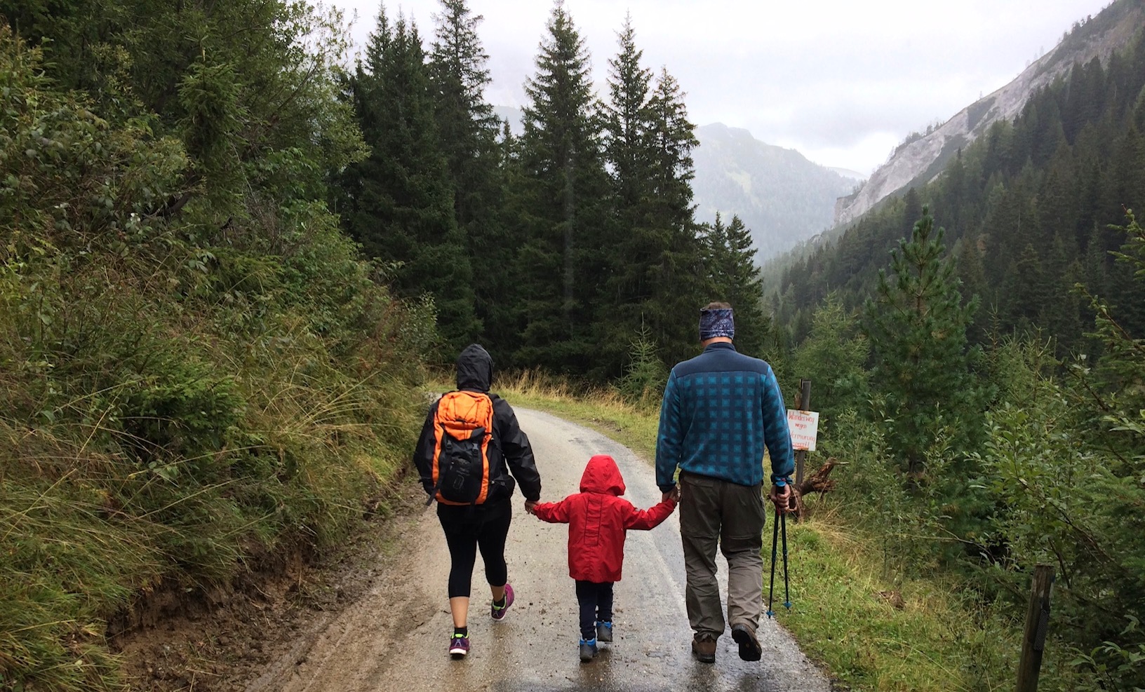 grandparents hiking with grandkid